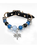 SoulBond Sweet Crystal Cat Collar with blue and black beads, a black strap and a silver-tone starburst charm