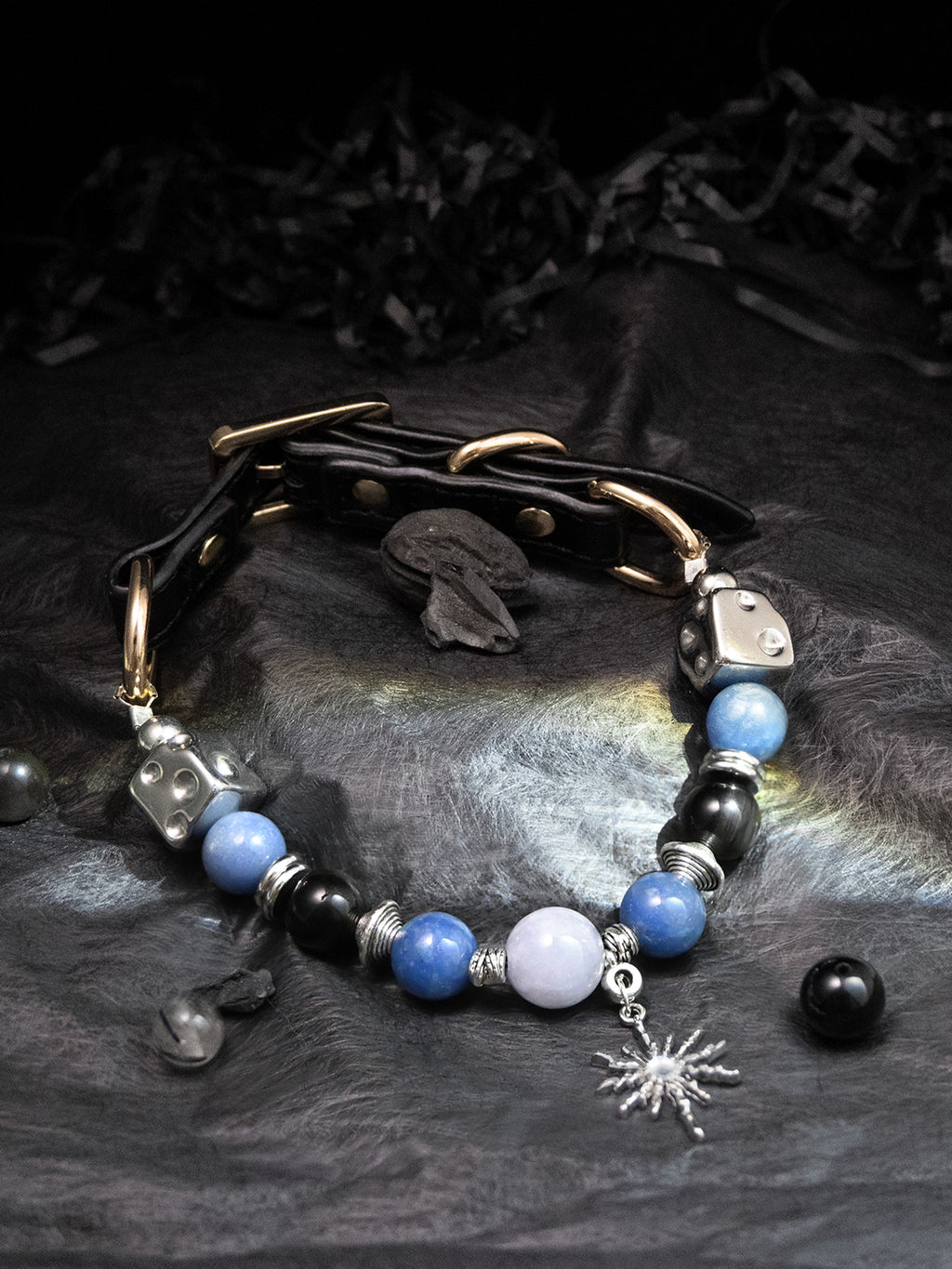 SoulBond Sweet Crystal Cat Collar with blue and black beads and silver-tone dice beads on dark textured fabric