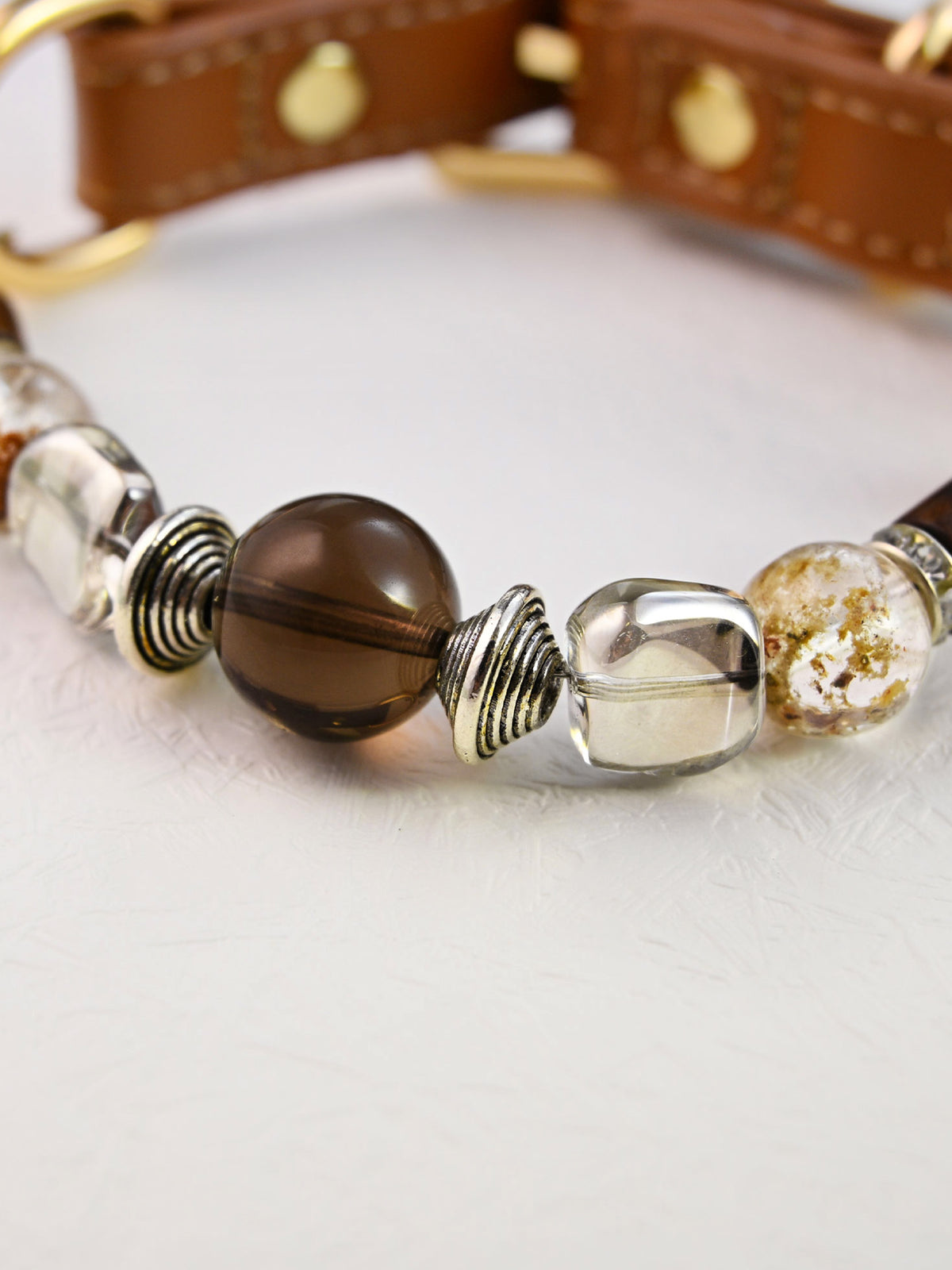 SoulBond Vintage Crystal Cat Collar close-up of a smoky brown center bead, clear shaped beads and silver-tone spiral spacers