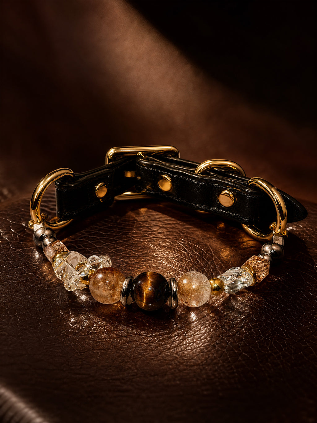 SoulBond Vintage Beaded Crystal Pet Collar with brown and clear beads and gold-tone hardware on a textured brown surface